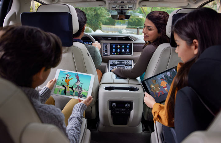 Man driving a connected General Motors vehicle